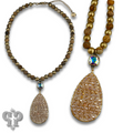 Woven bead pendant on stone bead necklace with crystals from Swarovski®