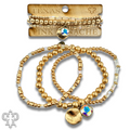 Matte gold and square glass bead bracelet stack with crystals from Swarovski®