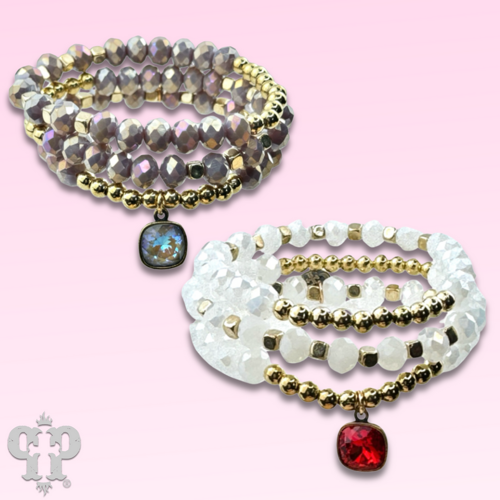 Faceted bead three strand bracelet with a crystal from Swarovski®