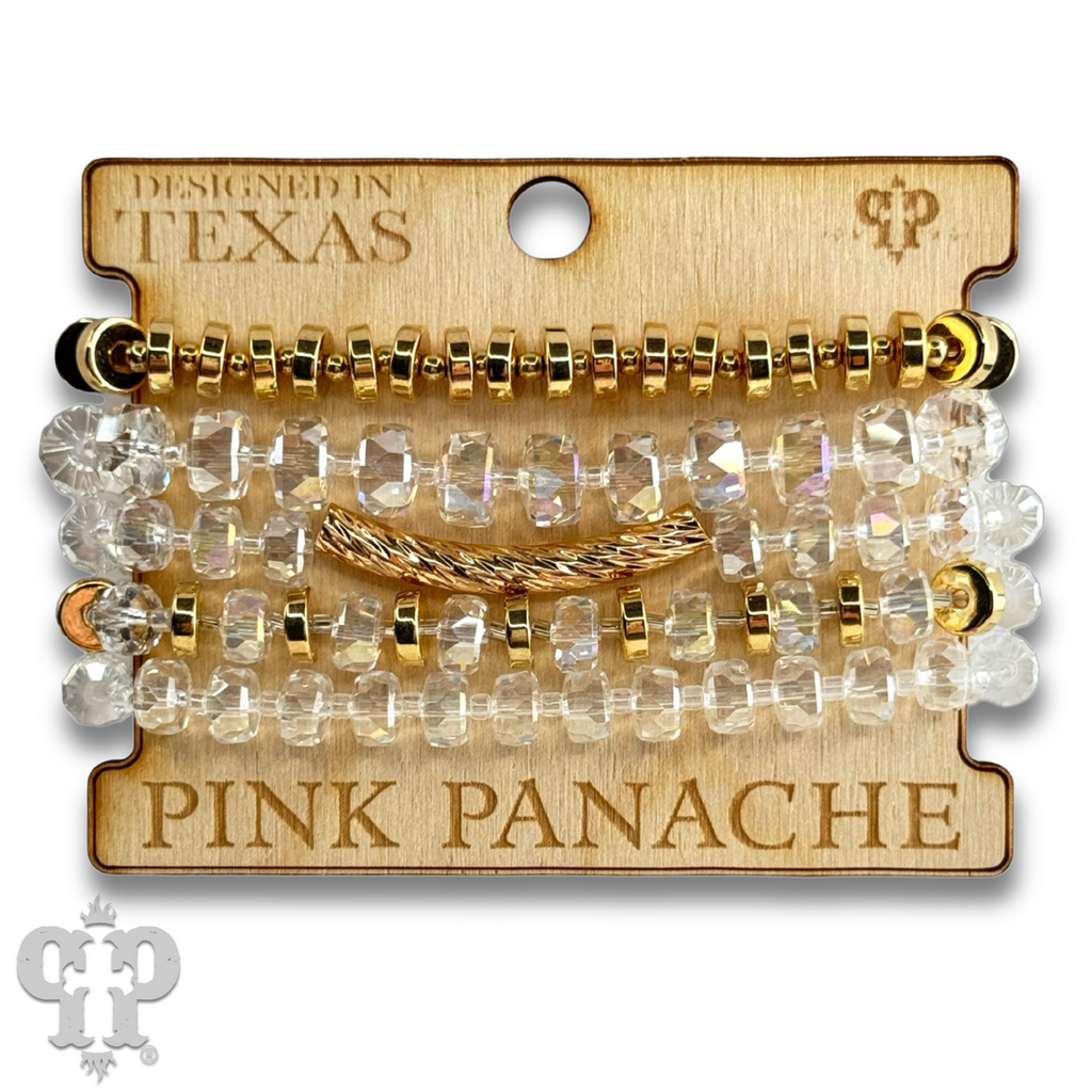 Faceted heishi bead bracelet with twisted tube bead feature